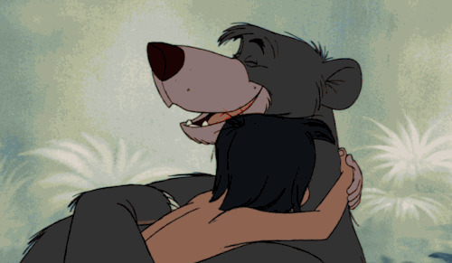 卡通小孩拥抱黑熊动态图片